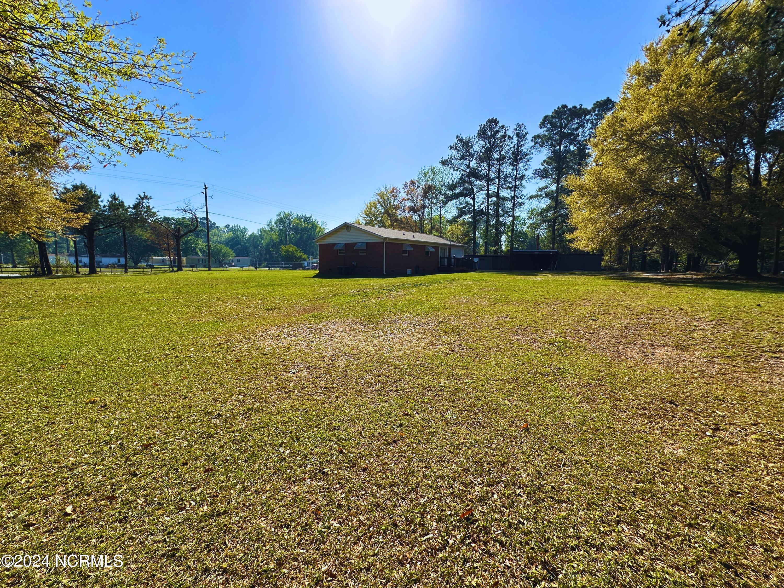 452 Nine Foot Road Newport, NC 28570 - Photo 32 of 32 side yard