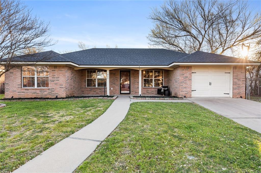 411 North Oak Drive Waco, TX 76705 - Photo 1 of 1 a front view of house with yard