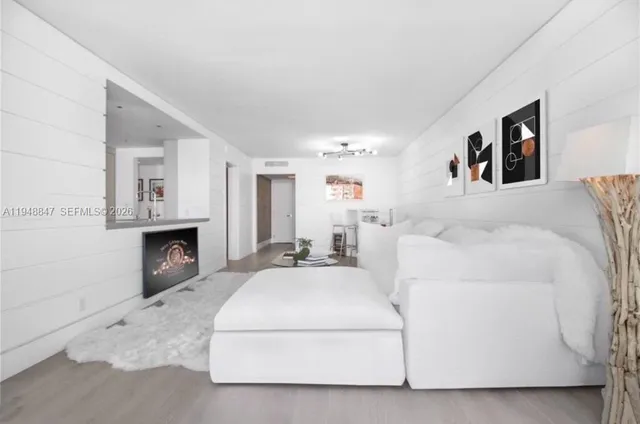 a bed room with a bed and a fireplace