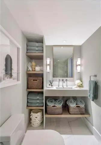 a dining room with a table and chairs