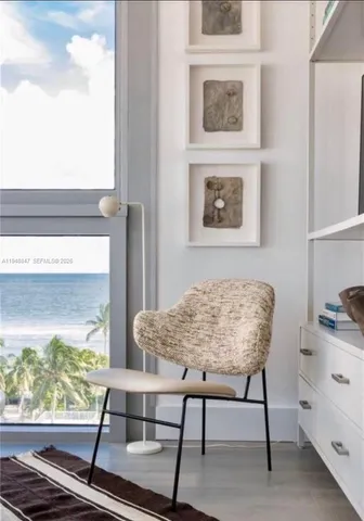 a view of a workspace with furniture