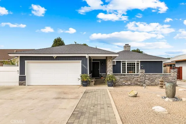a front view of a house with yard