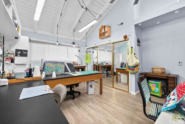 a room with furniture and a flat screen tv