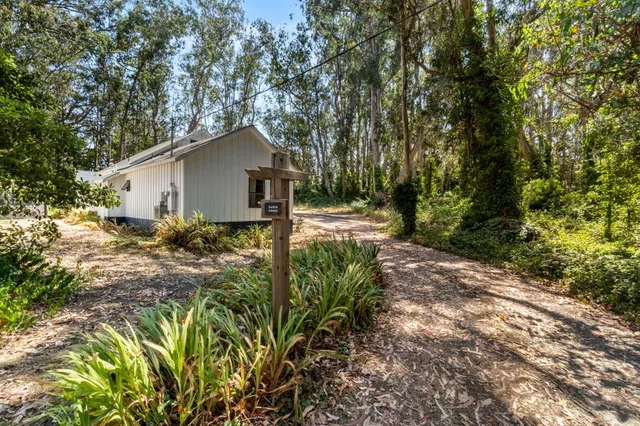 a kitchen with a stove and a refrigerator