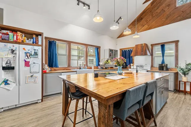 a view of a lake with a tree