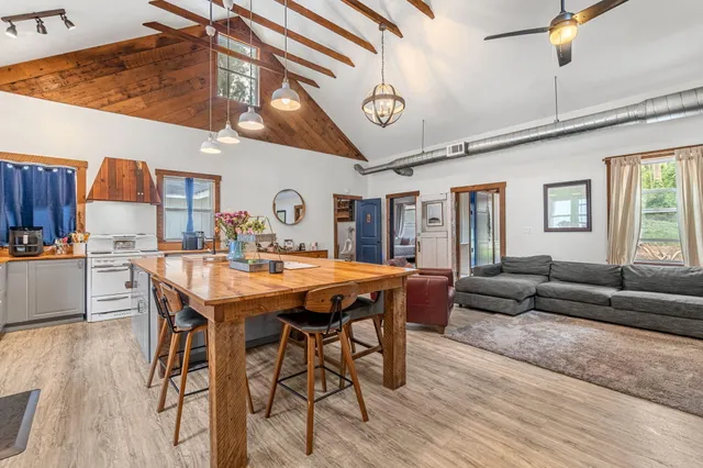 a view of outdoor space with deck and tree