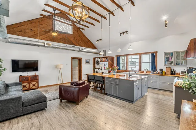 a bathroom with a bathtub and shower