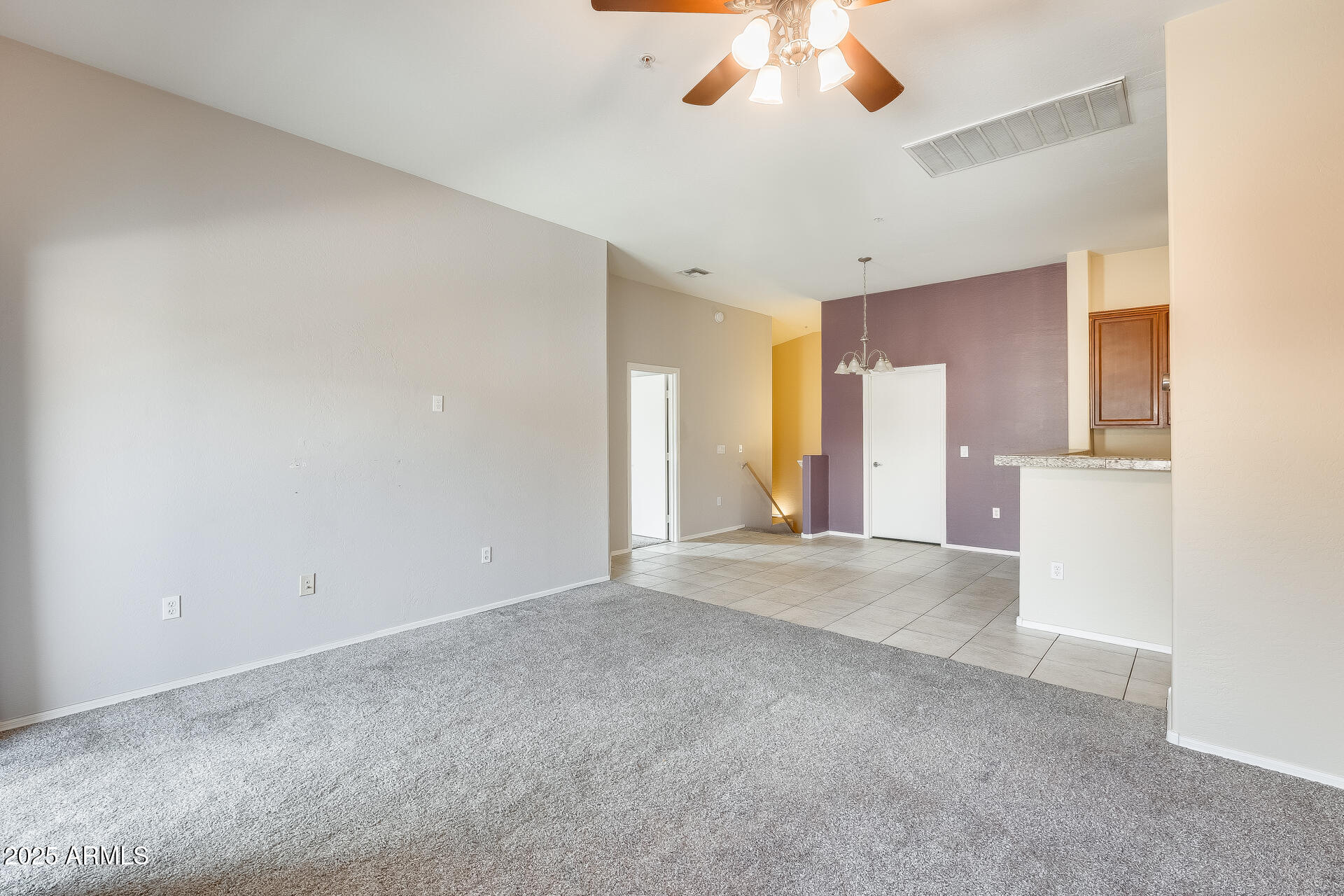2024 South Baldwin, Unit 113 Mesa, AZ 85209 - Photo 12 of 28 a view of empty room with a ceiling fan