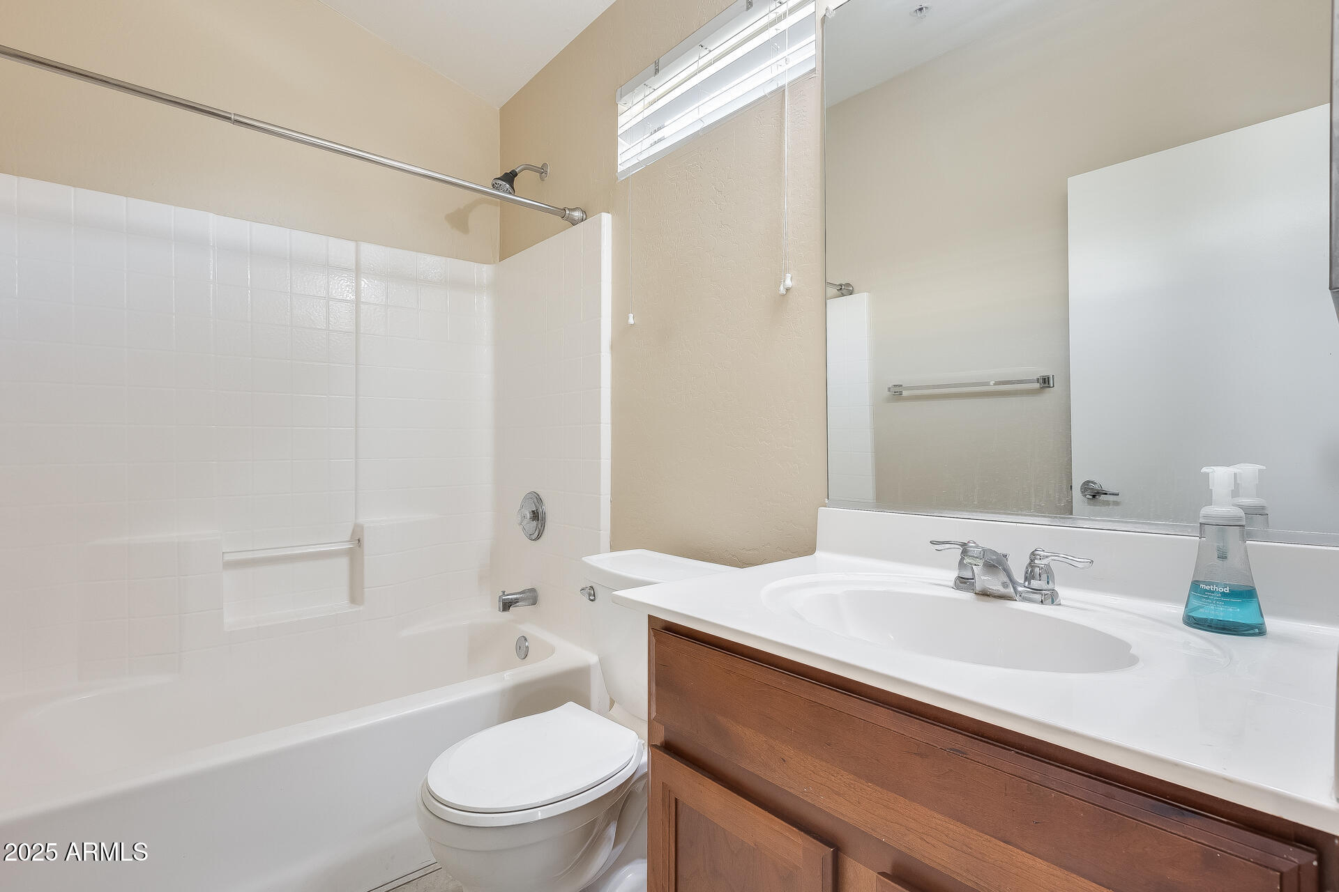 2024 South Baldwin, Unit 113 Mesa, AZ 85209 - Photo 17 of 28 a bathroom with a sink a toilet and a bathtub