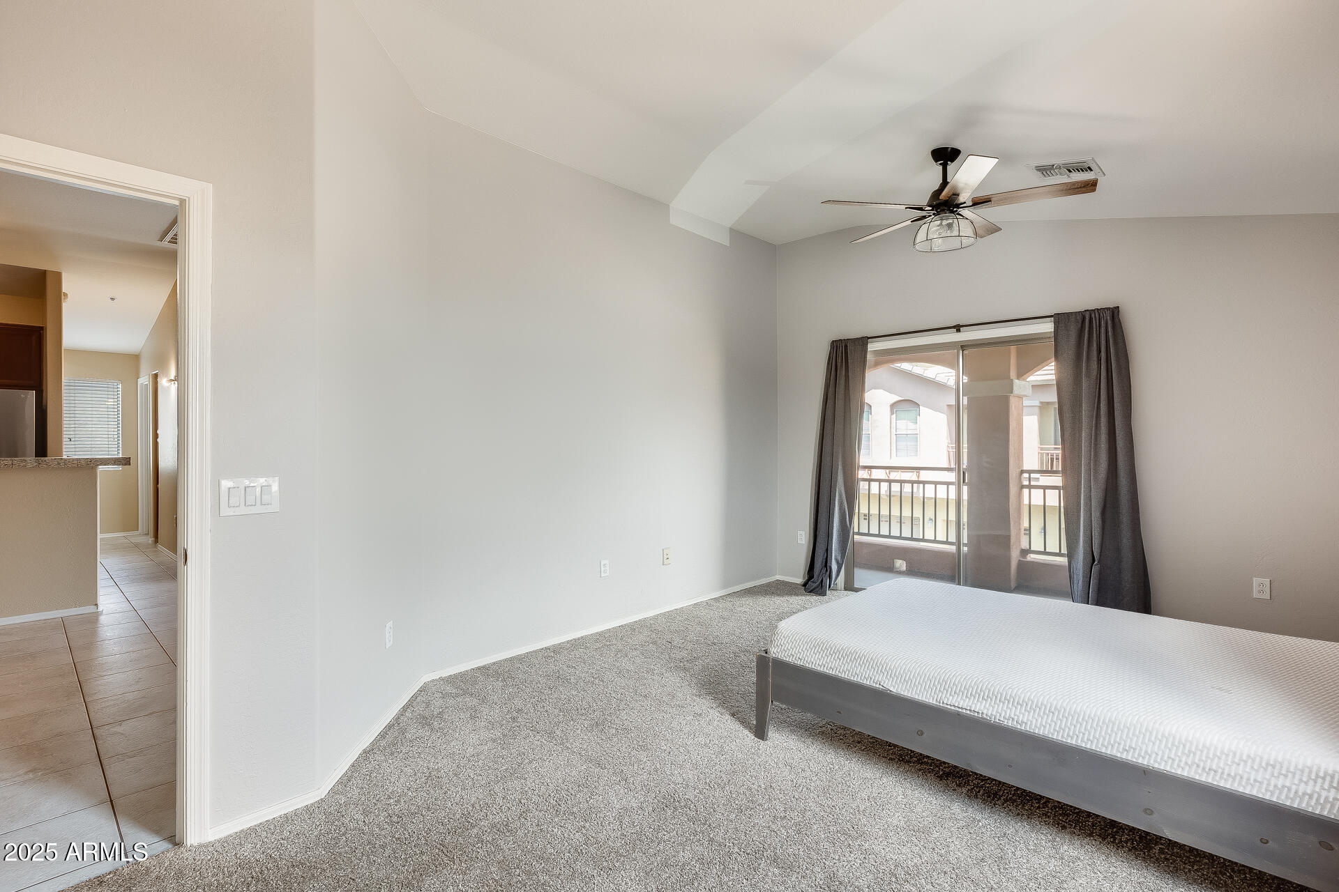 2024 South Baldwin, Unit 113 Mesa, AZ 85209 - Photo 26 of 28 a bedroom with a bed and a window