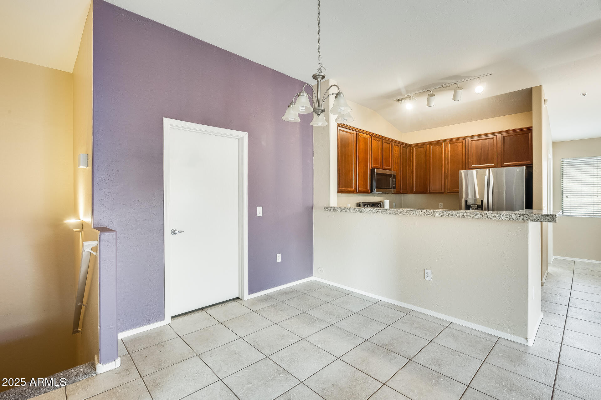 2024 South Baldwin, Unit 113 Mesa, AZ 85209 - Photo 8 of 28 a view of a kitchen with a sink and dishwasher a refrigerator with wooden floor