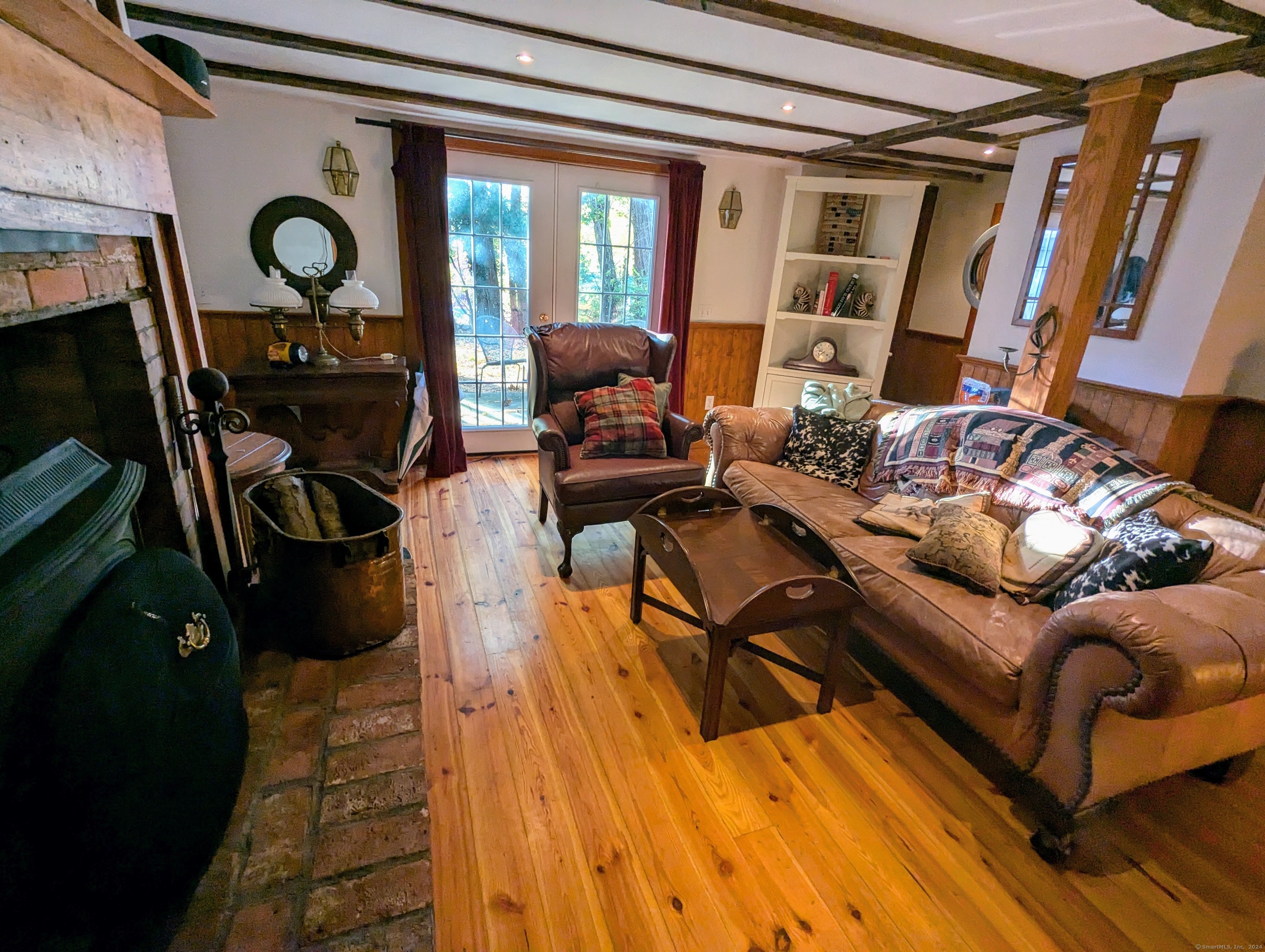 49 Hollow Tree Ridge Road Darien, CT 06820 - Photo 14 of 25 #49 - Family Room w/FPL & French Doors to Patio