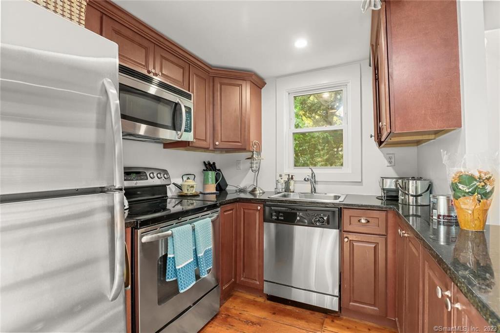 49 Hollow Tree Ridge Road Darien, CT 06820 - Photo 9 of 25 Update Kitchen with SS Appliances