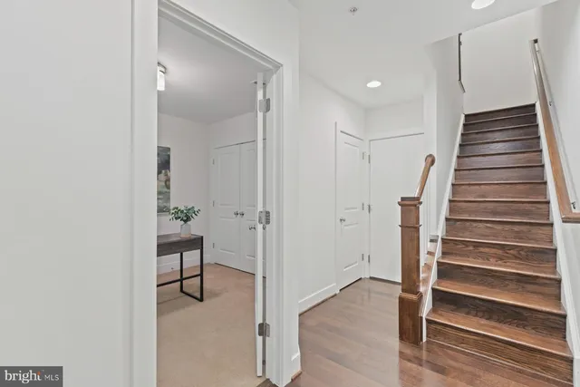 a view of entryway with wooden floor