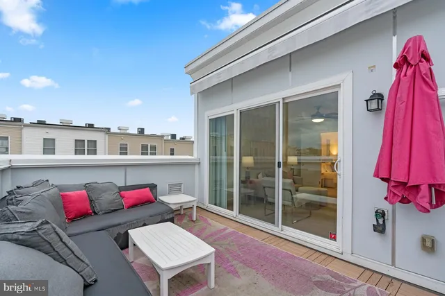 a view of a living room and a couch