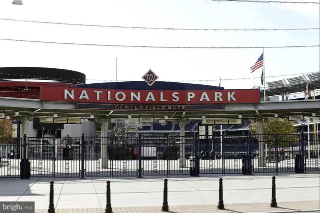 a view of a street with sitting area