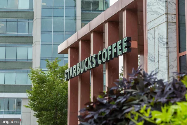 a house view with a flower garden