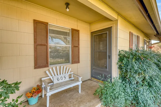 a picture of a bathroom with a bathtub