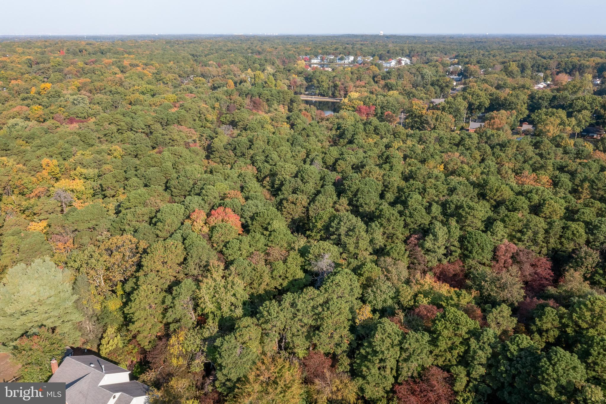0 Cardinal Lane Voorhees, NJ 08043 - Photo 30 of 35 a view of a city with lush green forest