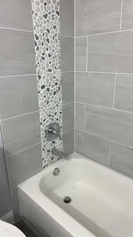 a bathroom with a bathtub