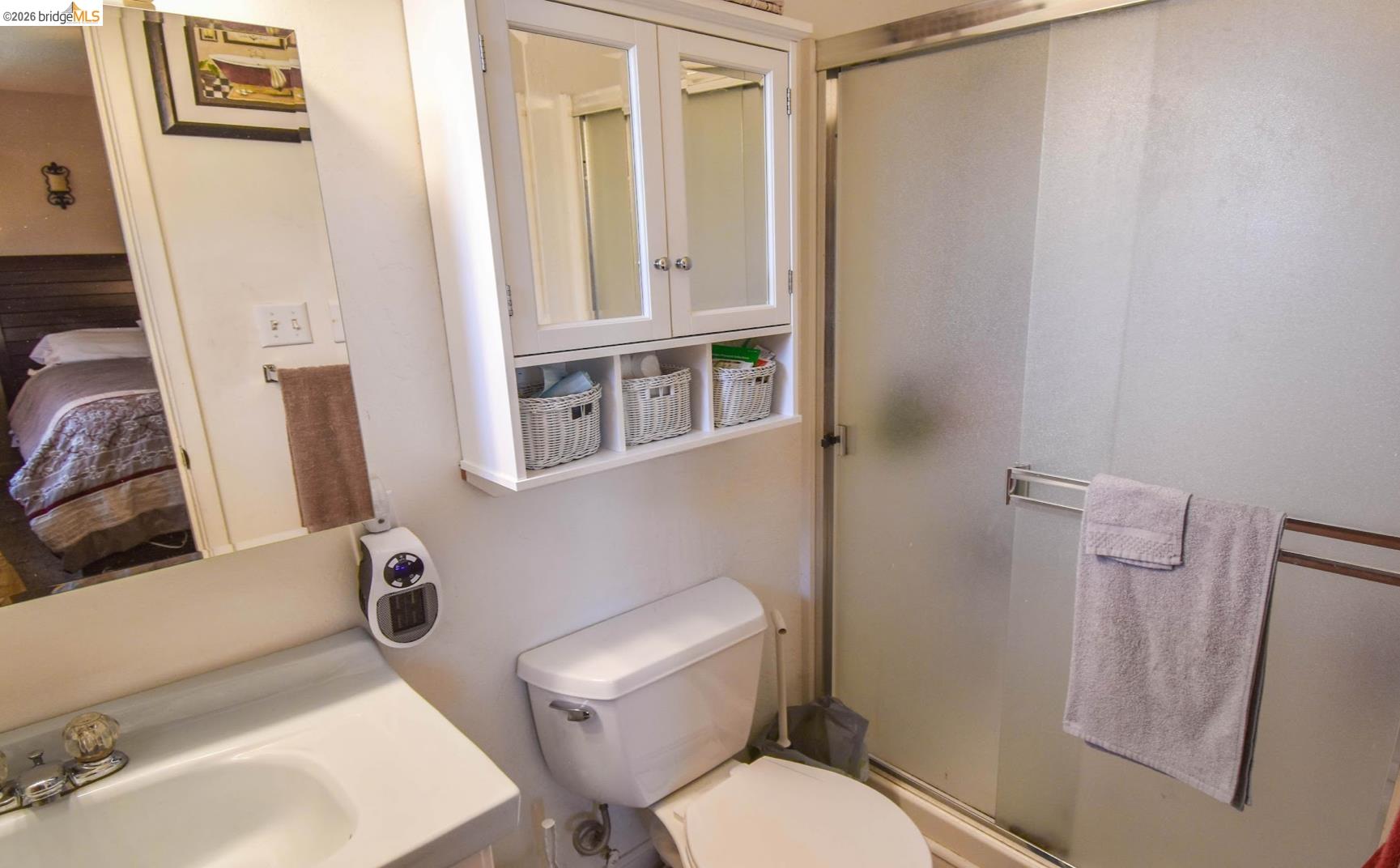 10569 Jim Brady Road Jamestown, CA 95327 - Photo 12 of 21 a white toilet sitting next to a bathroom sink