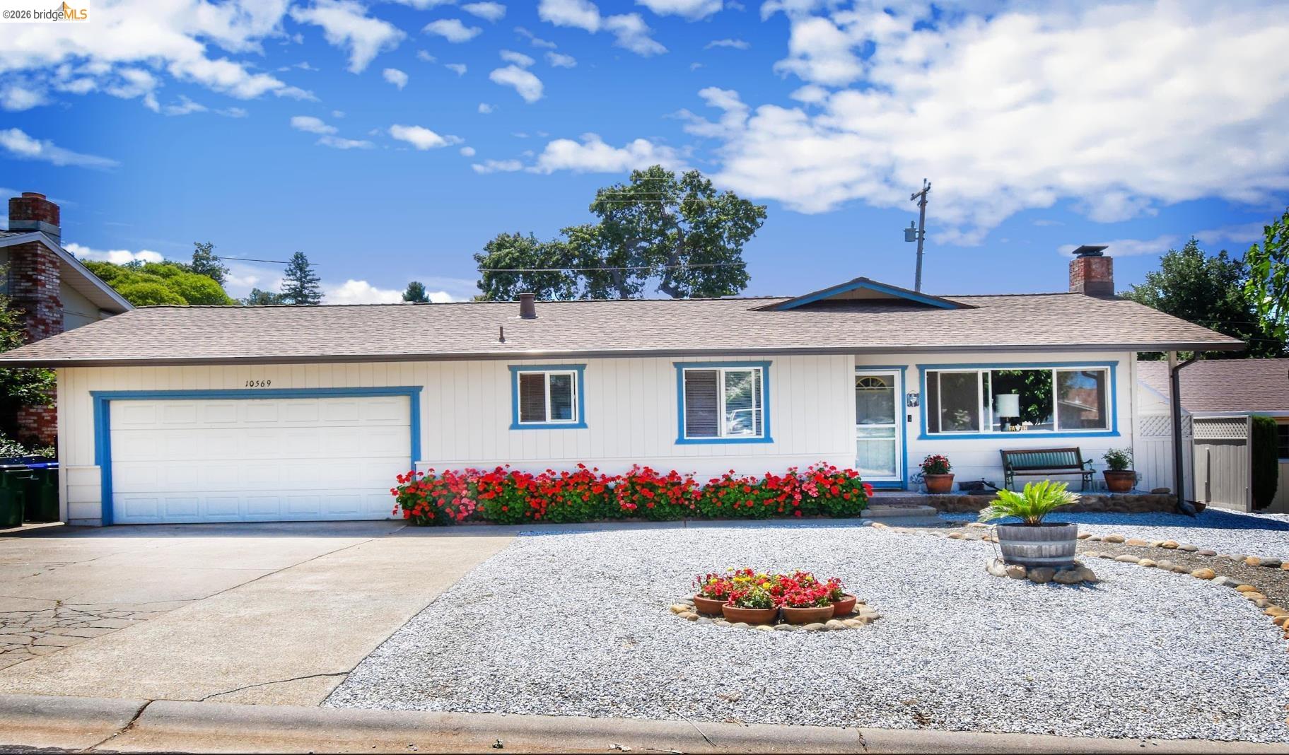 10569 Jim Brady Road Jamestown, CA 95327 - Photo 2 of 21 a front view of a house with a yard