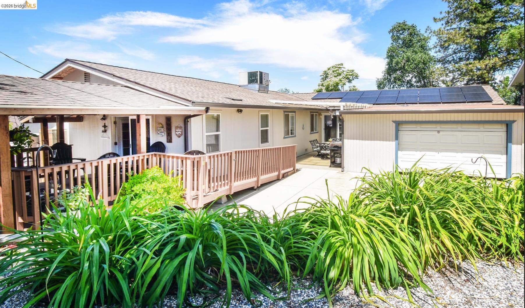 10569 Jim Brady Road Jamestown, CA 95327 - Photo 21 of 21 a front view of a house with garden
