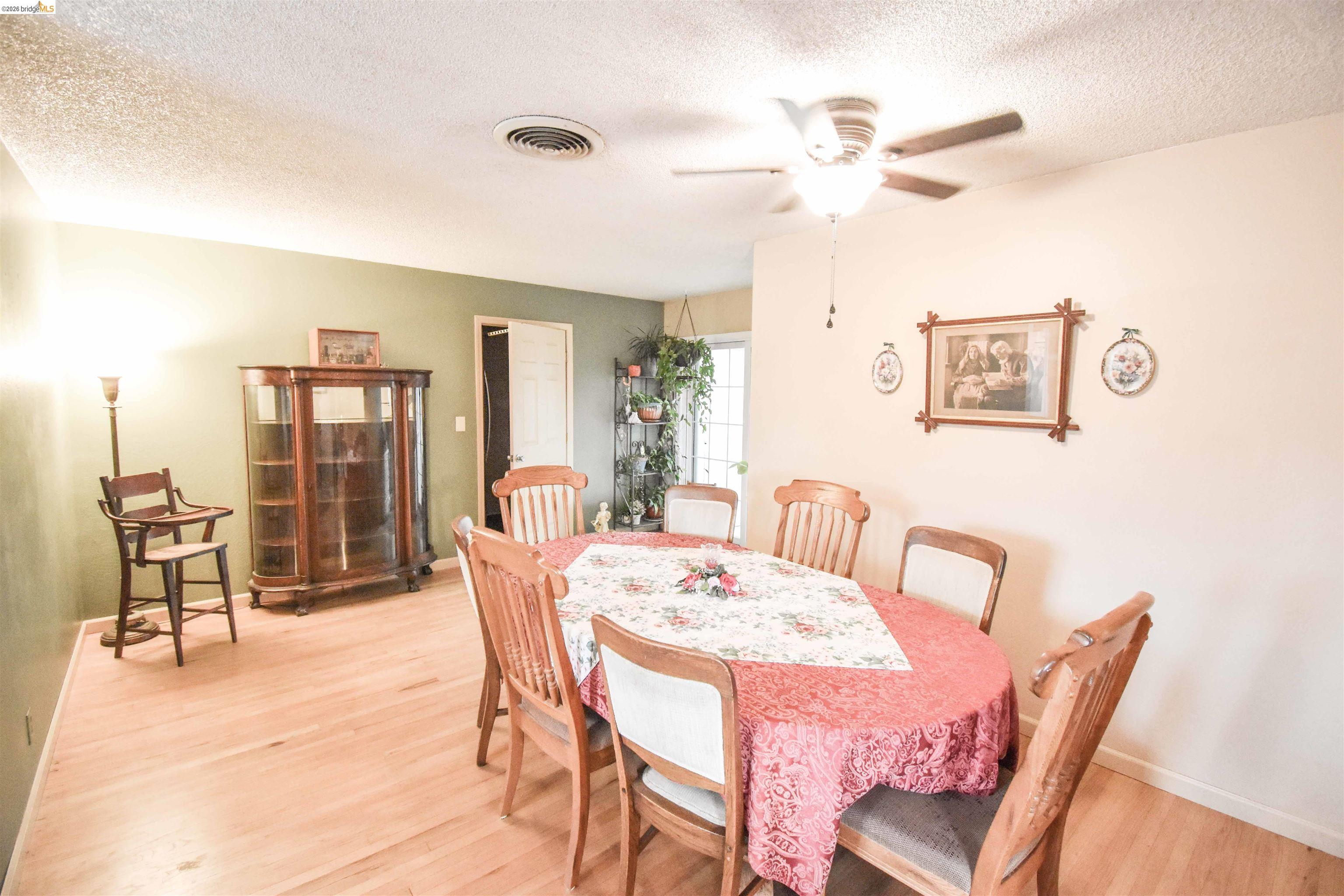 10569 Jim Brady Road Jamestown, CA 95327 - Photo 6 of 21 a dining room with furniture and window