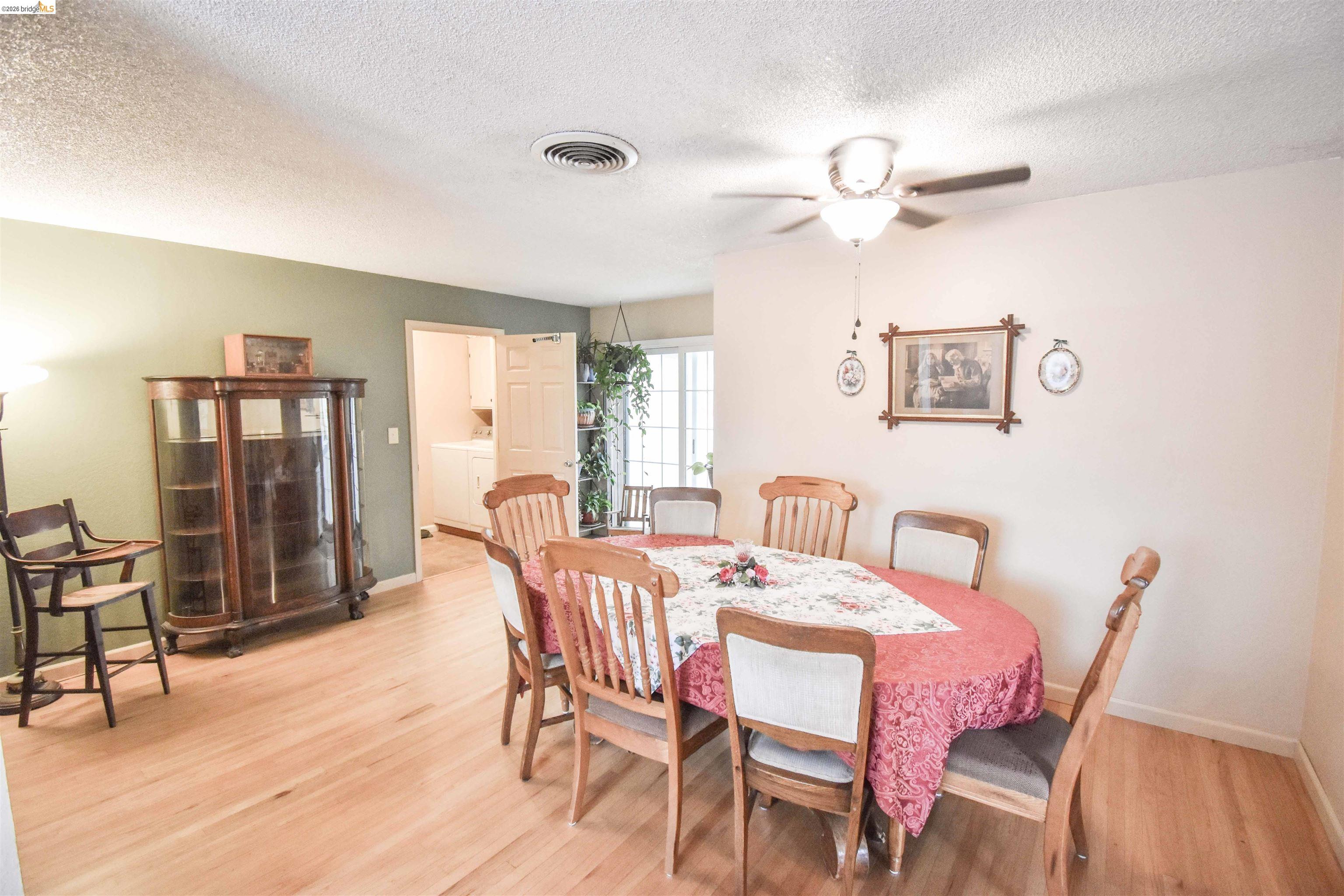 10569 Jim Brady Road Jamestown, CA 95327 - Photo 7 of 21 a dining room with furniture and window