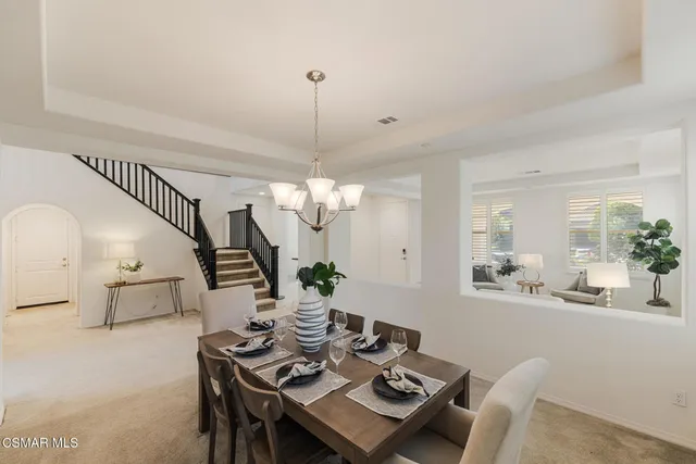 a view of a dining room with furniture