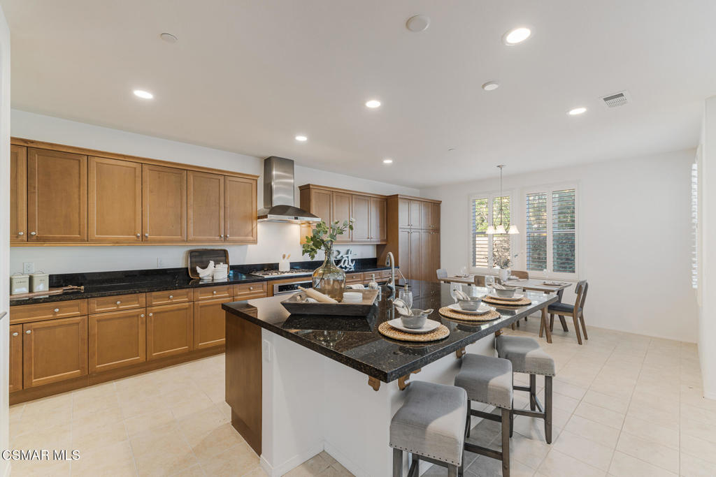 7020 Highgrove Place Moorpark, CA 93021 - Photo 19 of 59 a kitchen with a sink and counter top space