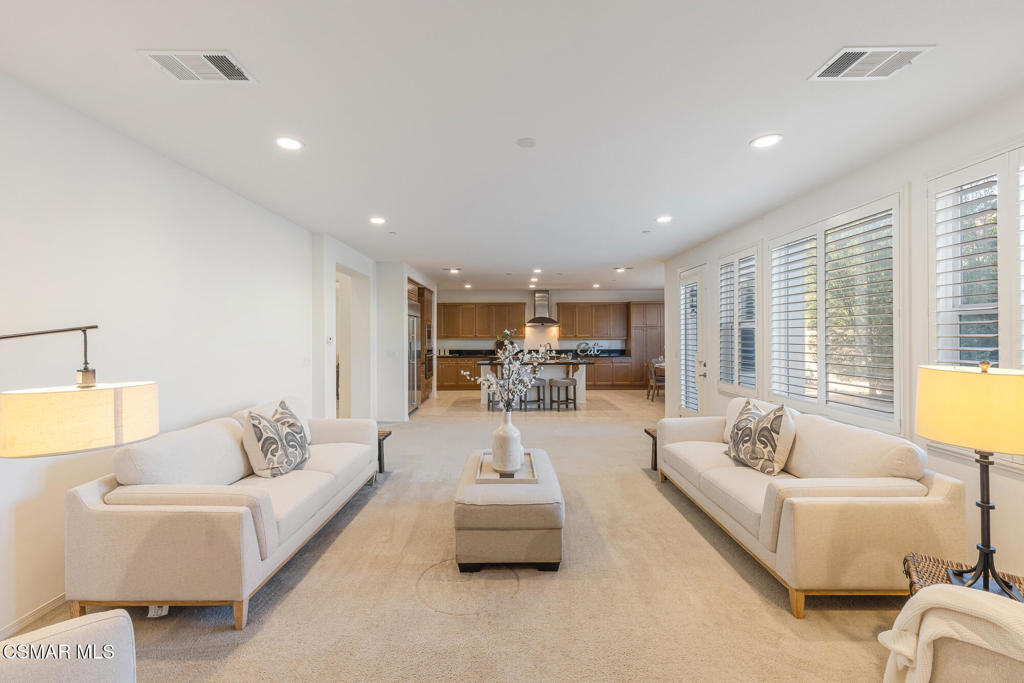 7020 Highgrove Place Moorpark, CA 93021 - Photo 29 of 59 a living room with furniture and a table