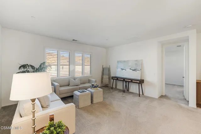 a bathroom with a sink vanity granite tub shower and a mirror