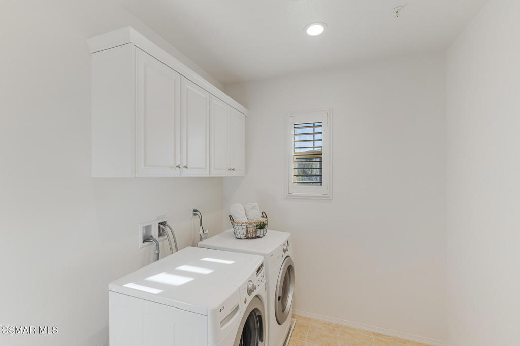 7020 Highgrove Place Moorpark, CA 93021 - Photo 39 of 59 a utility room with dryer and washer