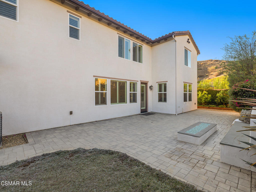 7020 Highgrove Place Moorpark, CA 93021 - Photo 48 of 59 a view of a house with a backyard