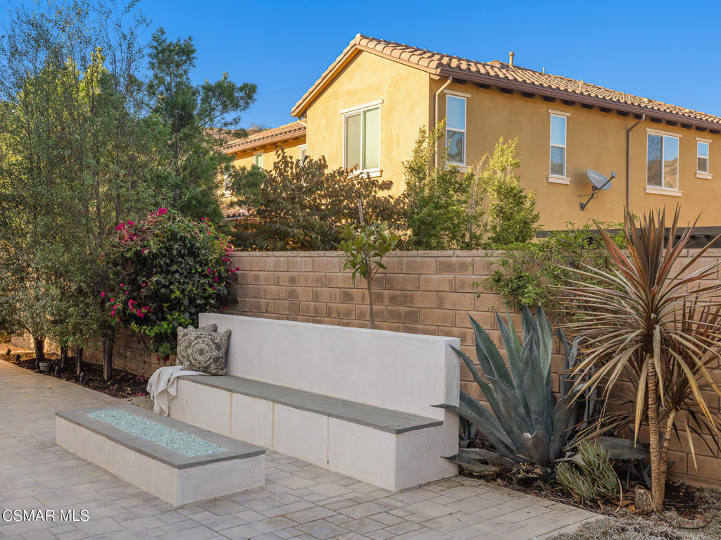 7020 Highgrove Place Moorpark, CA 93021 - Photo 49 of 59 a view of a back yard of the house
