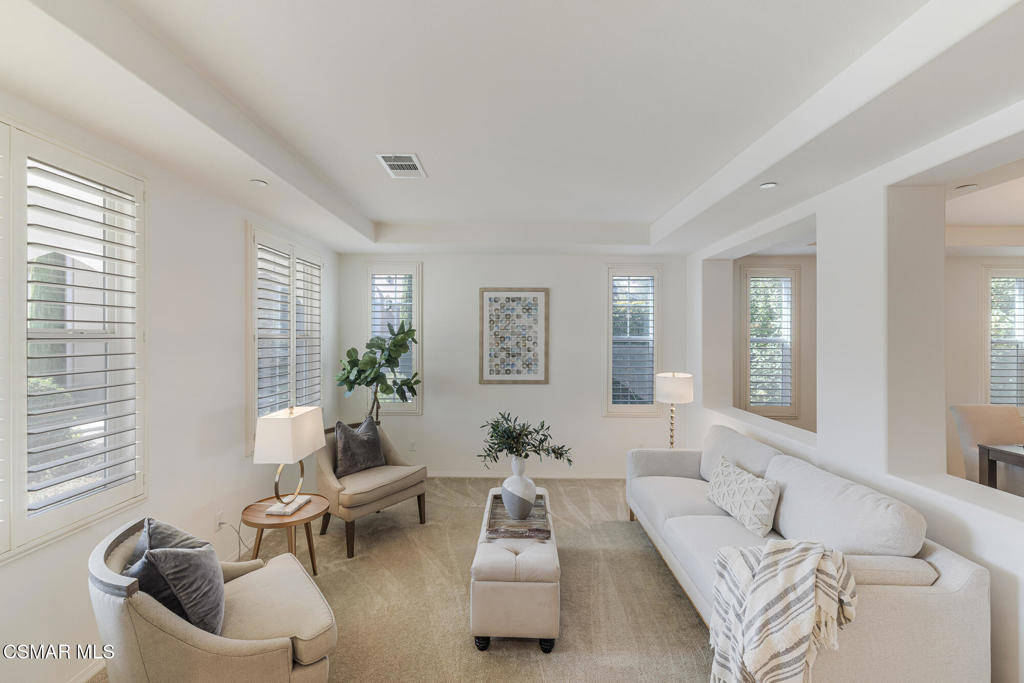7020 Highgrove Place Moorpark, CA 93021 - Photo 6 of 59 a living room with furniture and a large window