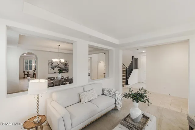 a view of a livingroom with furniture and window