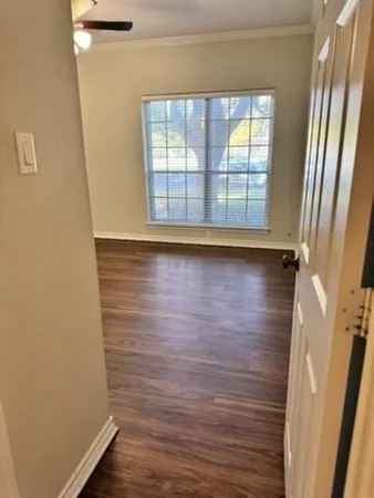 a view of a door in an empty room