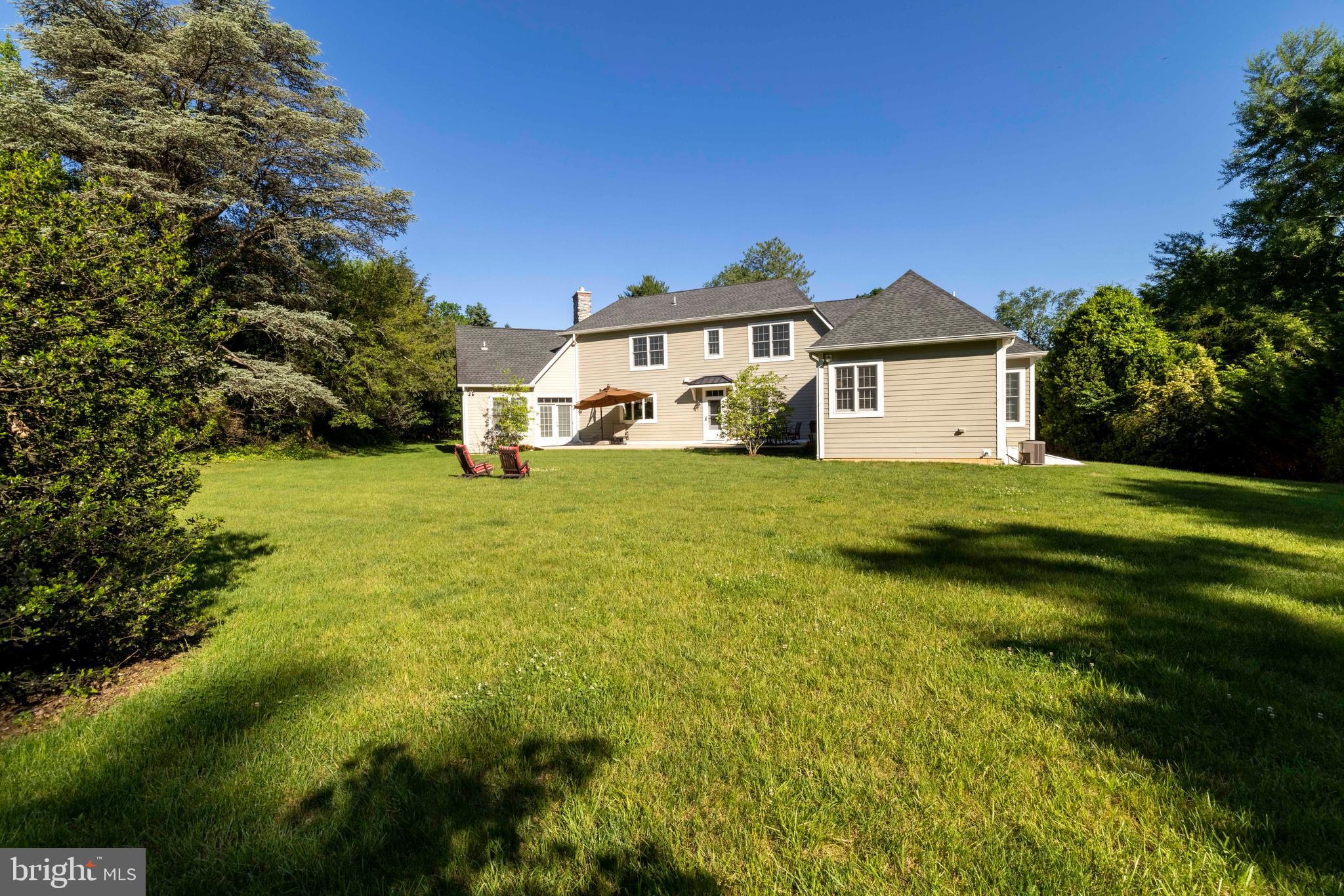 1031 Coates Road Jenkintown, PA 19046 - Photo 63 of 66 a view of a house with a big yard and large trees