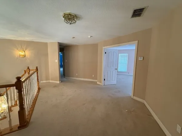 a view of a hallway with entryway