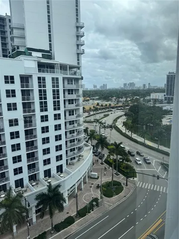 a view of a lake with a city