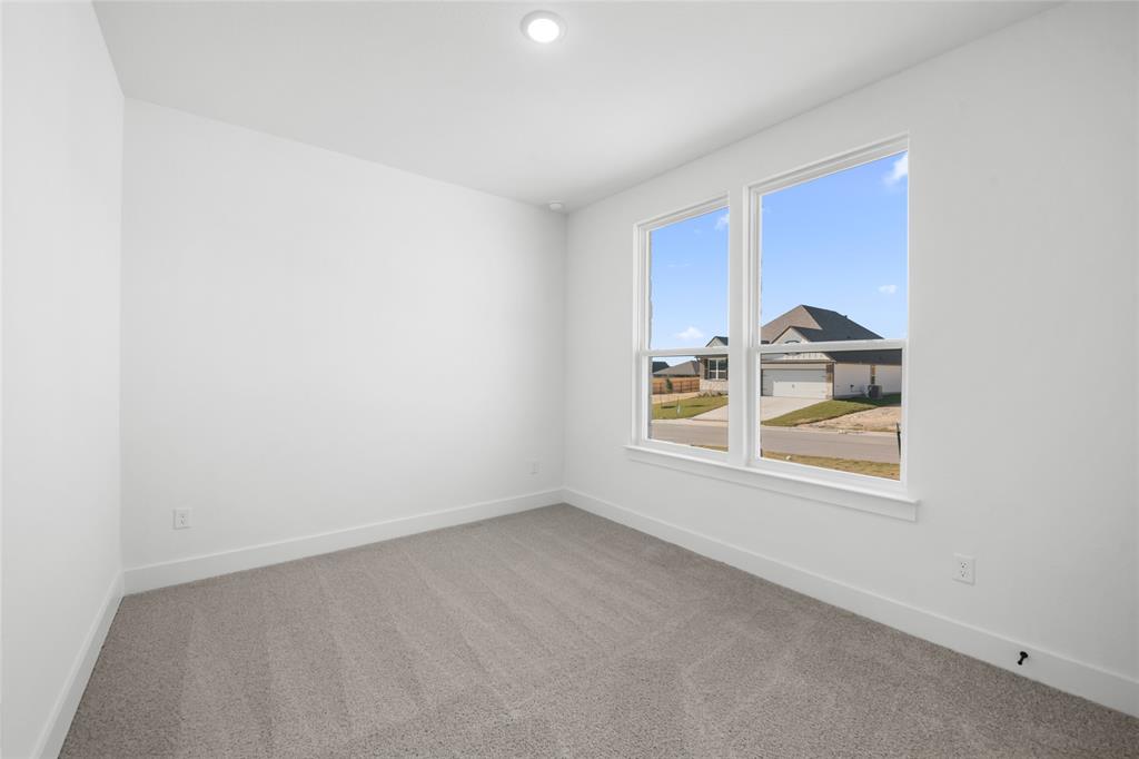 3000 Teasdale Road Lorena, TX 76655 - Photo 12 of 16 an empty room with a window