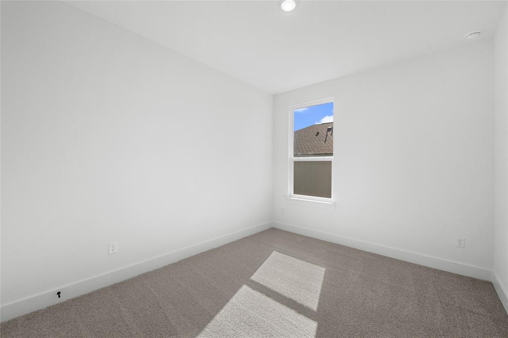 3000 Teasdale Road Lorena, TX 76655 - Photo 13 of 16 an empty room with a window