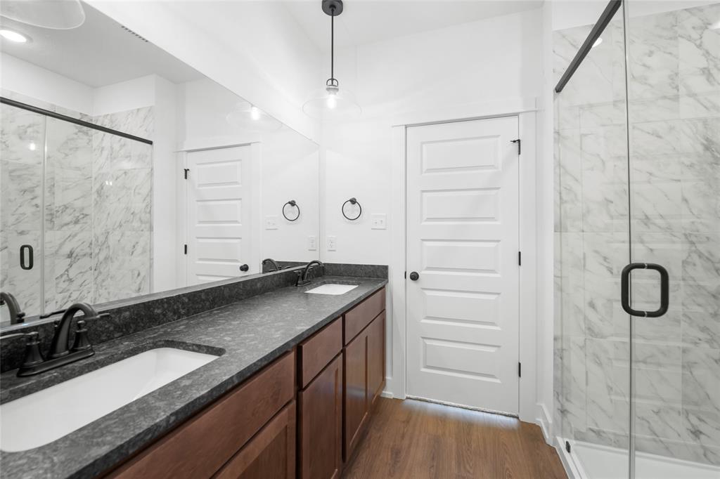 3000 Teasdale Road Lorena, TX 76655 - Photo 9 of 16 a bathroom with a granite countertop sink mirror and double