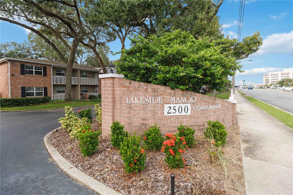 2500 Lee Road, Unit 244 Winter Park, FL 32789 - Photo 20 of 26 a sign on the side of a building
