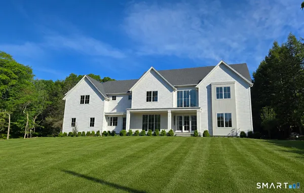 a view of house with outdoor space
