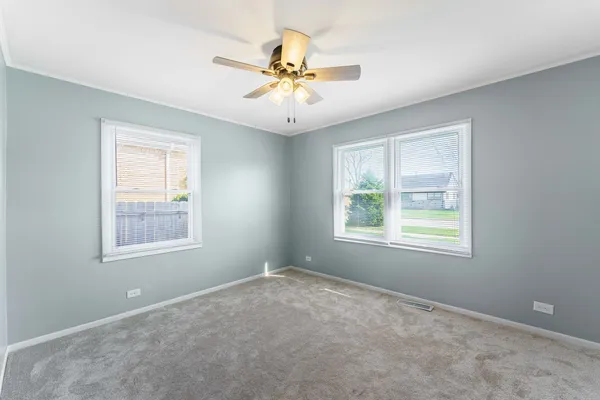 a view of a hallway with a window