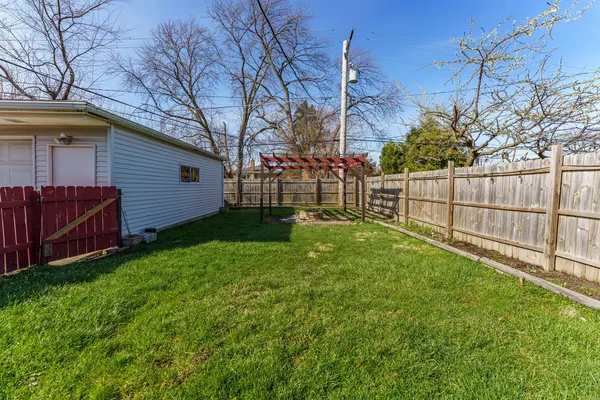 a view of backyard with green space