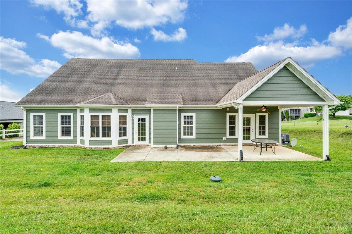 1250 Our Cove Road Huddleston, VA 24104 - Photo 49 of 70 a view of a house with a backyard
